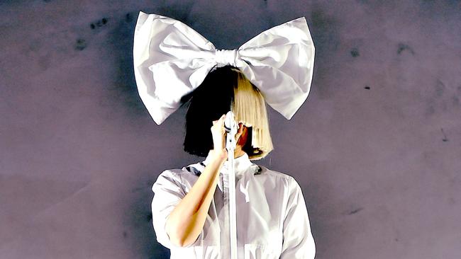 INDIO, CA - APRIL 17: (EDITOR'S NOTE: This image has been digitally filtered.) Singer Sia performs onstage during day 3 of the 2016 Coachella Valley Music & Arts Festival Weekend 1 at the Empire Polo Club on April 17, 2016 in Indio, California. (Photo by Kevin Winter/Getty Images for Coachella)