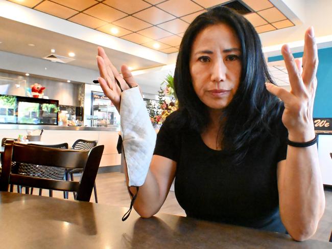 Jenny Um owner of Cafe 21 says her cafe business is being seriously affected by the mask mandate. Picture Julianne Osborne