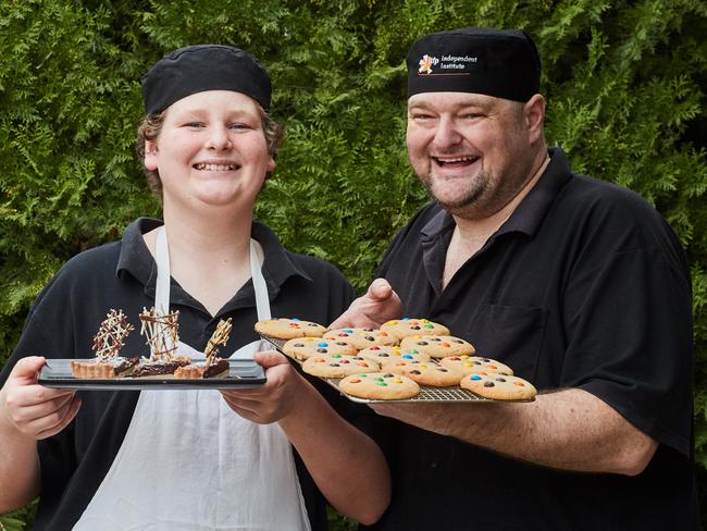 Daniel-Jack Forrester and father Daniel with some of their cookies. Picture: Matt Loxton