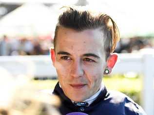 Jockey Luke Tarrant has put his career on the line again when he was caught driving on meth shortly after facing court on a string of other drug crimes. (AAP Image/Albert Perez)