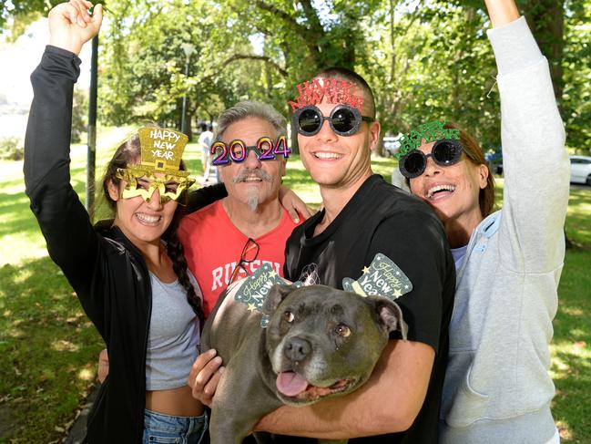 Sarah Saizi with Joe, Jarrod and Sheila Matino and Lucy the dog on New Year’s Eve. Picture: Andrew Henshaw