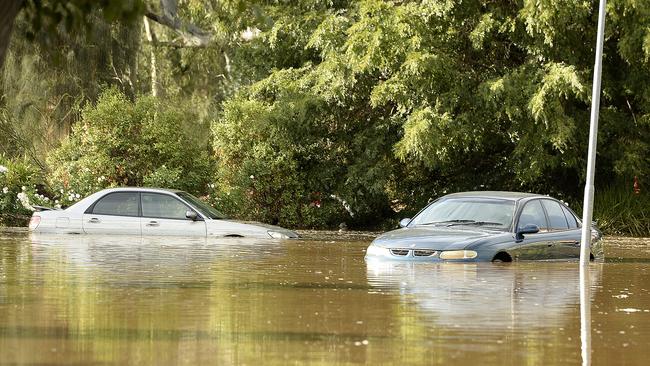 Submerged cars on Willow Drive, Paradise. Picture: Bianca De Marchi