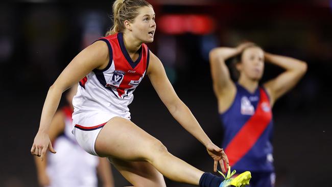 Diamond Creek defender Laura Duryea looks on in despair as Katie Brennan kicks the sealer for Darebin. Picture: Michael Klein.