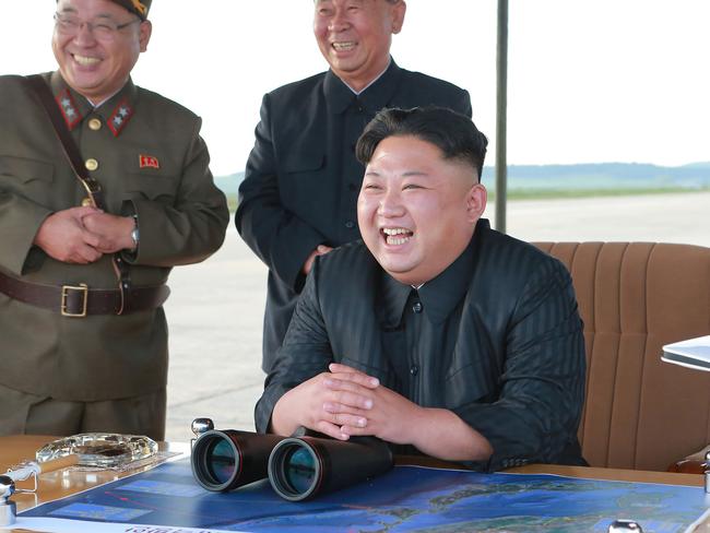 Kim Jong-un inspecting a launching drill of the medium-and-long range strategic ballistic rocket Hwasong-12. Picture: AFP