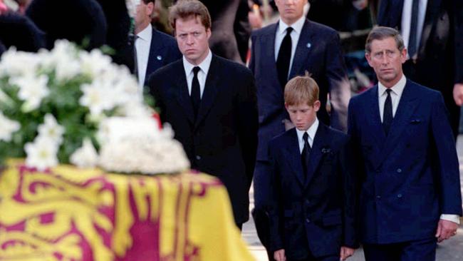 The coffin of Princess Diana making its way to Westminster Abbey on September 06 1997. Following behind are Prince Charles, right, Prince Harry, centre, and Diana’s brother, Earl Spencer, left. Picture: AP