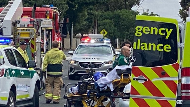 Emergency services at the scene of the collision between a car and motorbike at the Fullarton Road / Parade West intersection at Kent Town. Picture: Patrick James