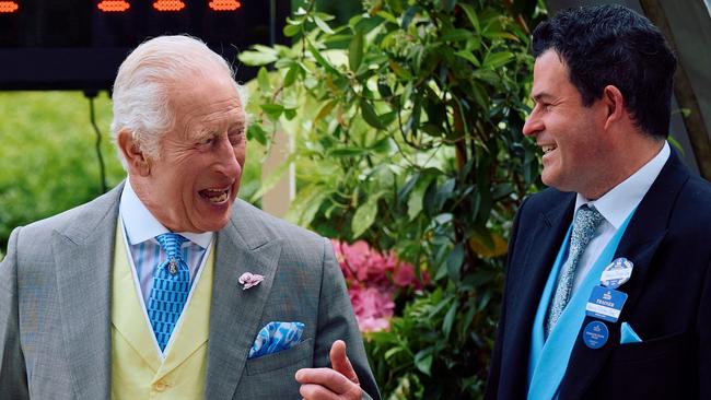 King Charles speaks with Henry Dwyer after Asfoora won at Royal Ascot. Picture: AFP