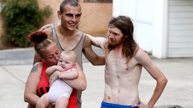 Mum and dad Kristy Morton with baby Navaeh and Tony Finn (right) who caught the baby. Picture: Brianne Makin