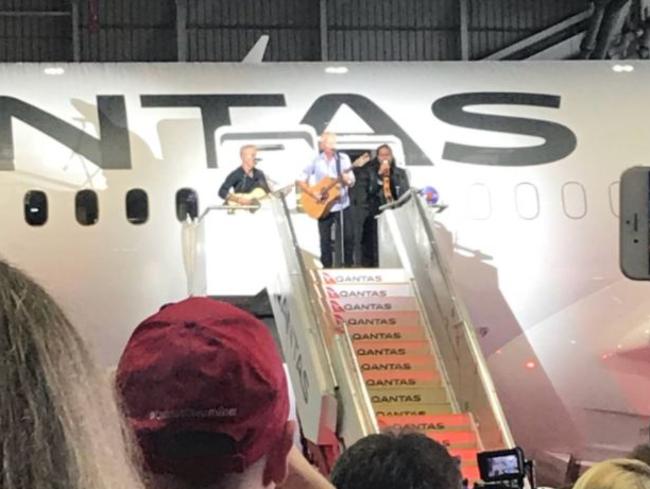 Icehouse performing their hit Great Southern Land as the band emerges from a Qantas plane called Great Southern Land is peak Australia.