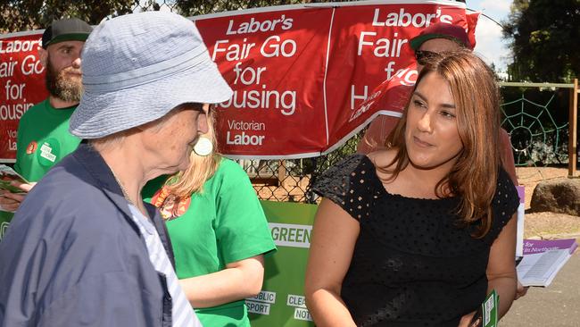 Ms Thorpe hands out how-to-vote cards before the heavens opened.