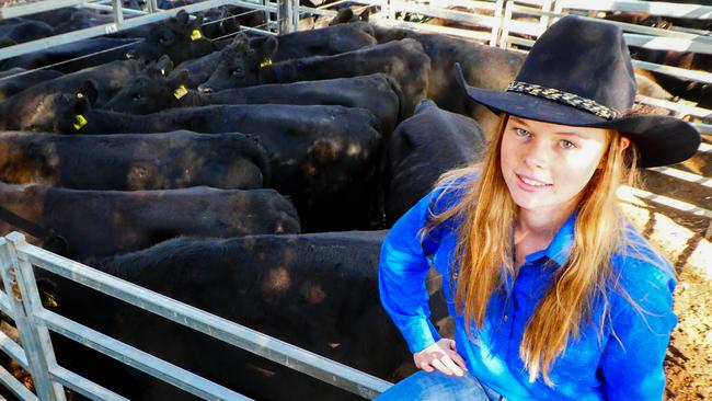 Erin McCormack with some of her family's Angus heifers and calves. Picture: Supplied