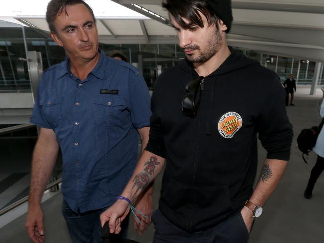 Broadbridge, pictured with his father at Adelaide Airport, has returned to Australia after visiting her in Bogota. Picture: Kelly Barnes/The Australian