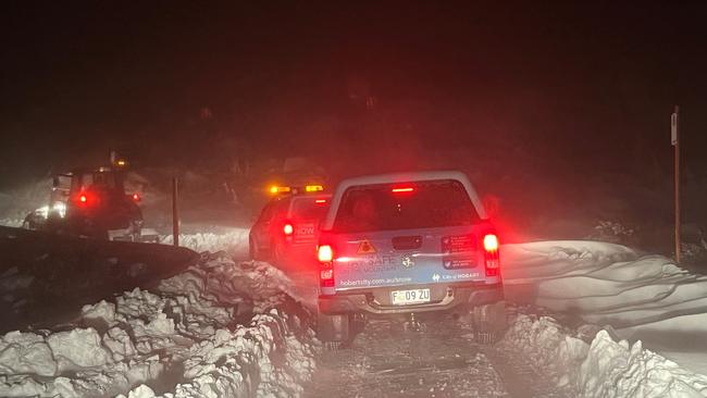 Hobart City Council workers brave think snow and blizzard conditions on their way to rescue walkers stranded on kunanyi/Mt Wellington. Picture: City of Hobart