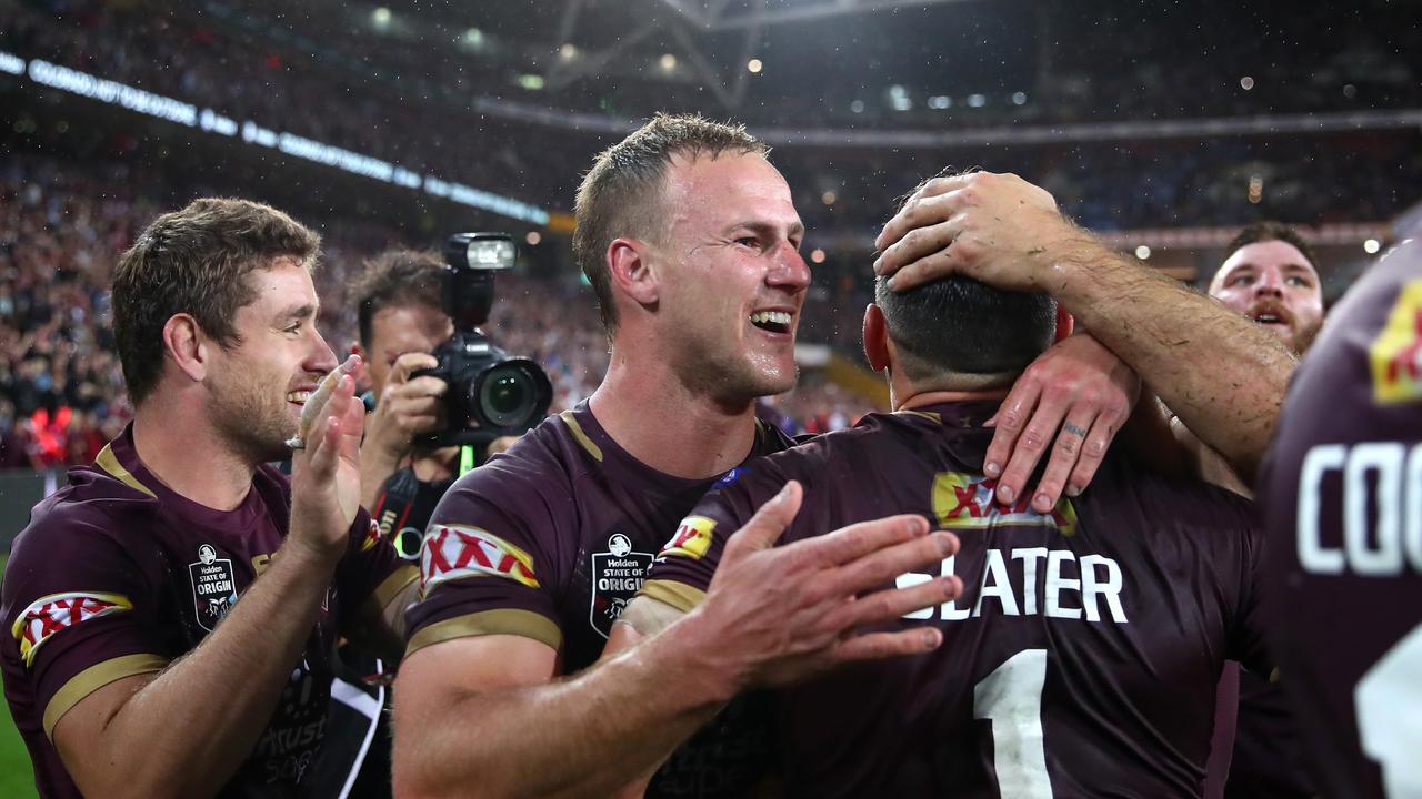 Daly Cherry-Evans of Queensland celebrates with teammates after winning Game Three of the State of Origin series.