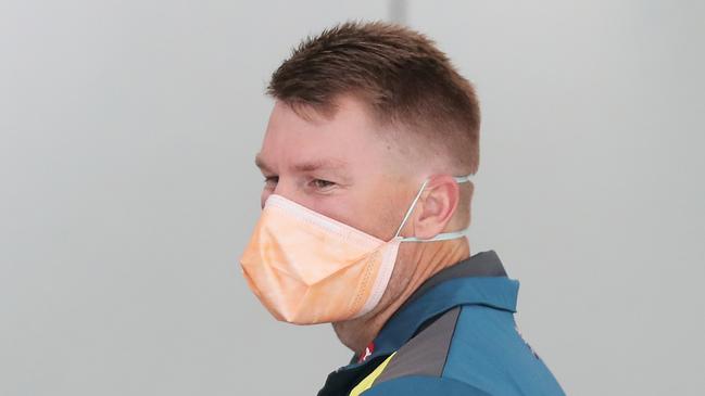 Australian cricketer David Warner at Sydney airport on Sunday. Picture: Getty Images