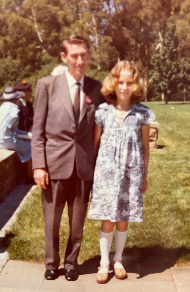 Royse Davies and daughter Joanne at an investiture ceremony at Government House in Canberra in 1976, where he was awarded a Bravery Medal for his courageous act during the Tasman Bridge disaster. Picture: Supplied