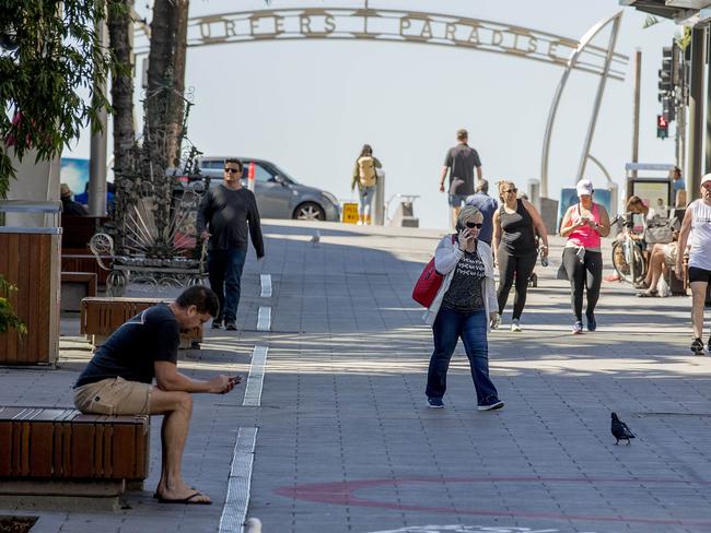 Thoughts on Surfers Paradise from locals and tourists.   Picture: Jerad Williams