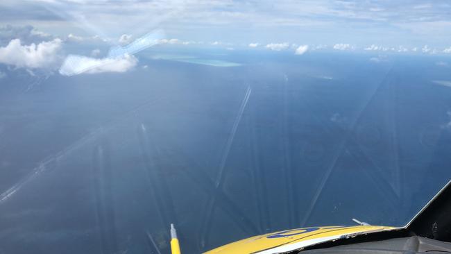 Rescue 300 en route to Heron Island to transfer a patient back with symptoms of a marine sting. Picture: RACQ CapRescue