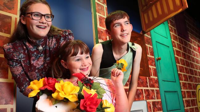 Tessa Miller, 14, Emma Shatell, 9, and Tom Hall, 14, are appearing in the Comedy Capers Gang Show at the Shedley Theatre in Elizabeth. Picture: Dean Martin