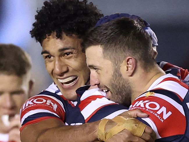 SYDNEY, AUSTRALIA - SEPTEMBER 09:  James Tedesco, Luke Keary and Siua Wong of the Roosters celebrate winning the NRL Elimination Final match between Cronulla Sharks and Sydney Roosters at PointsBet Stadium on September 09, 2023 in Sydney, Australia. (Photo by Mark Metcalfe/Getty Images)