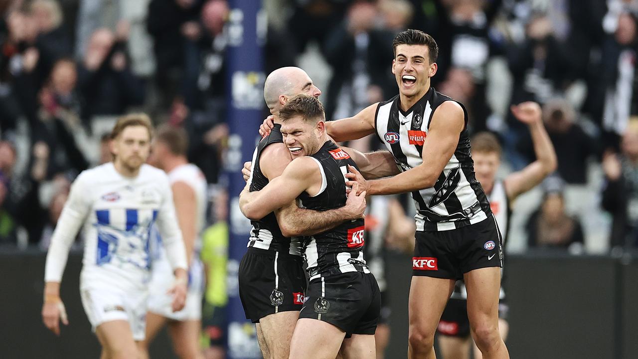 Steele Sidebottom celebrates with Taylor Adams and Nick Daicos. Picture: Michael Klein