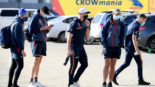 Crows players at West Lakes on Tuesday morning get word they are on the move. Picture: Mark Brake