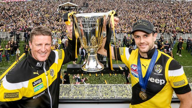 Richmond coach Damien Hardwick and captain Trent Cotchin hold up the 2017 premiership cup. Picture: Tim Carrafa