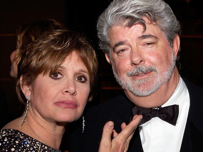 Fisher in 2005 with <i>Star Wars</i> creator George Lucas. Picture: AFP