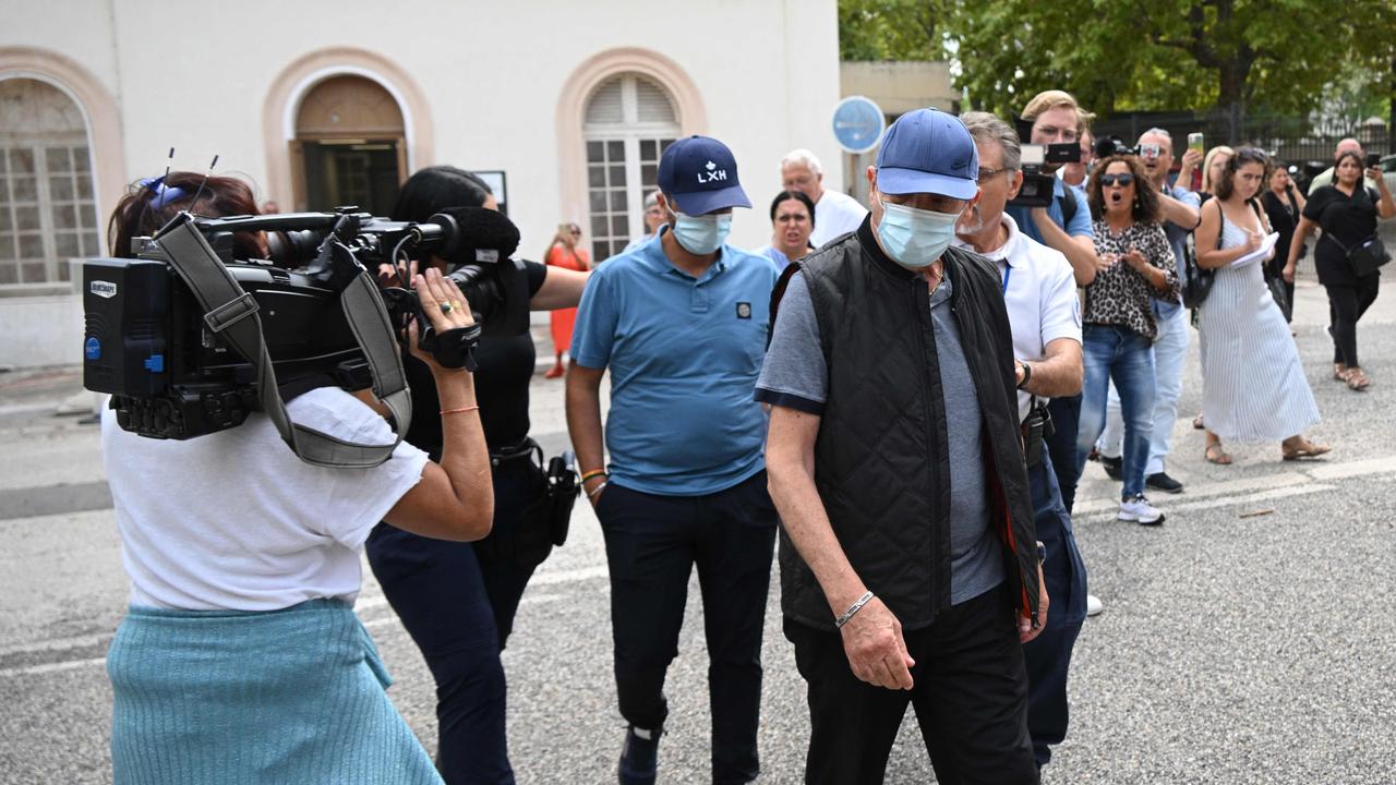 Lionel Guedj (middle) would allegedly force healthy patients to undergo unnecessary procedures and then reap the social security payments. Picture: Christophe Simon / AFP