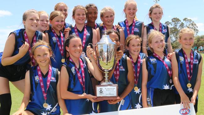 Mooloolaba State School primary girls celebrate after winning the 2020 AFLQ Schools Cup grand final over Oakleigh. Picture: Tom Threadingham