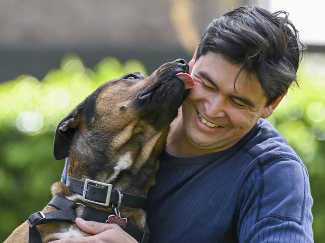 Michael Fiergert and his Staffie Cross Mastiff "Wally" play in a park at bellevue Heights Monday,September,4,2023.Picture Mark Brake