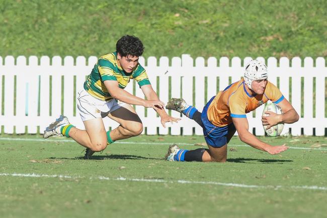 Joey Cervetto scores a try earlier this year.