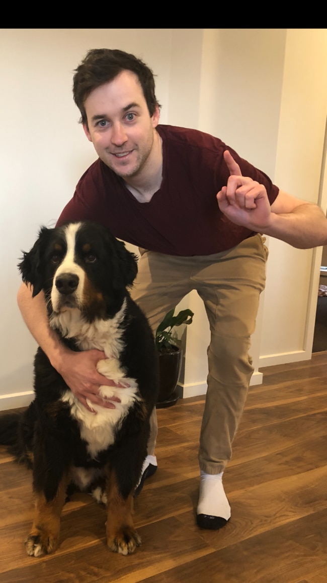 SuperCoach AFL 2020 winner Jason Barnett with his team mascot Crosby.