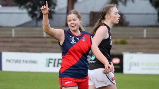 Tegan Brett celebrates a goal for Coburg. Picture: Dan Atamian