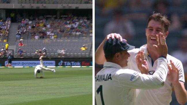 Diving Khawaja takes clean grab