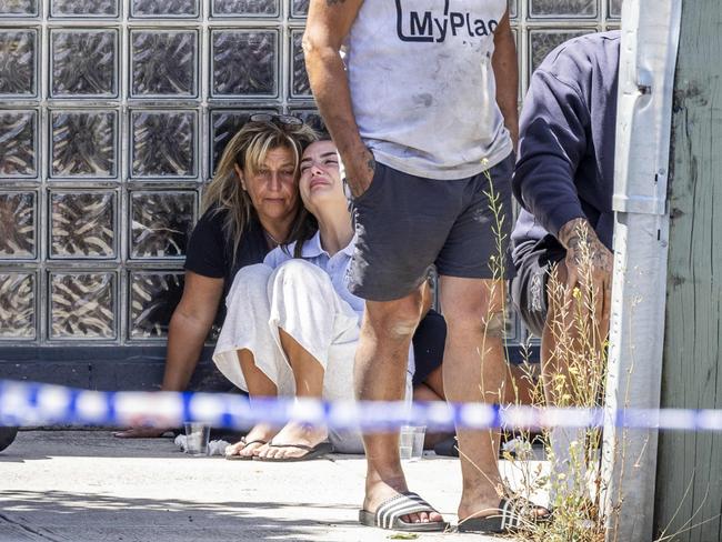 Emotional friends and family of Abdulrahim gathered at the site of the shooting on Monday. Picture: Jake Nowakowski