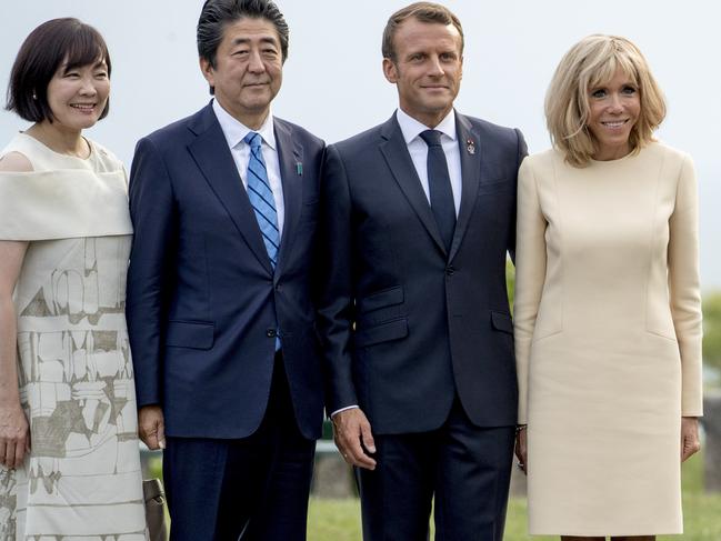 Pictured (from left) Akie Abe, the wife of Japanese Prime Minister Shinzo Abe, French President Emmanuel Macron, and his wife Brigitte Macron in Biarritz, France. Picture: AP