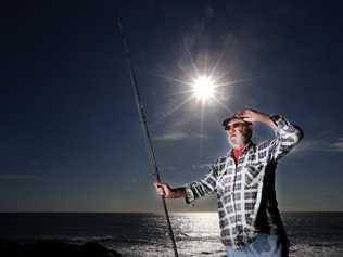 Tweed fisherman Mr Edwin "Snow" Ducat surveys the ocean before a morning's fishing off therocks at Hastings Point on the Tweed Coast. Picture: Scott Powick