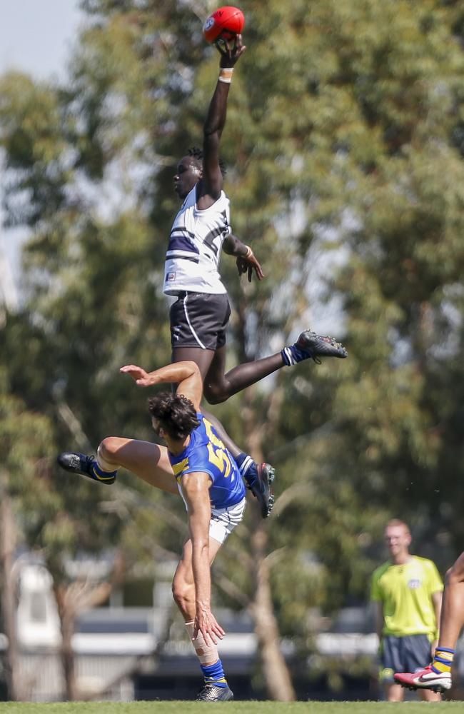 NAB League boys: Northern Knights v Western Jets. Akuei Dominic (Northern) and Paul Tsapatolis (Western). Picture: Valeriu. Campan