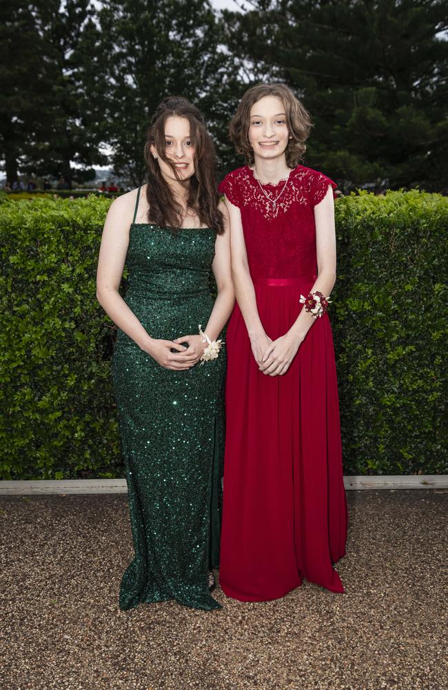 Sisters Charlotte (left) and Natalie McBryde at Centenary Heights State High School formal at Picnic Point, Friday, November 15, 2024. Picture: Kevin Farmer