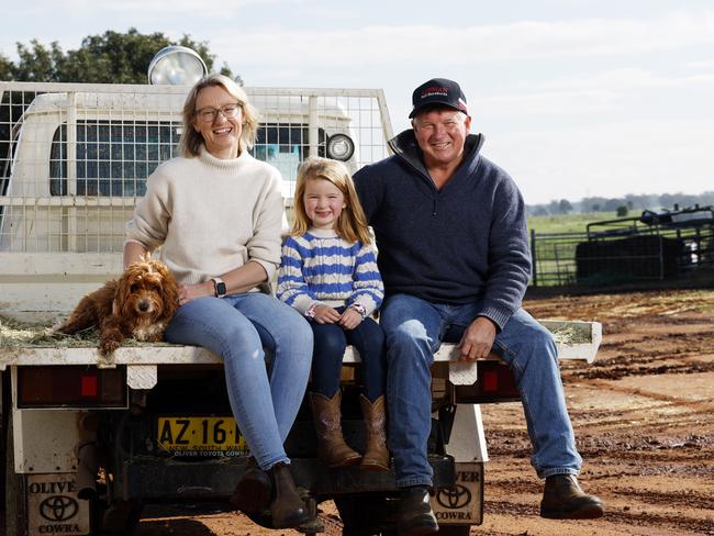 DAILY TELEGRAPH AUGUST 15, 2024. EMBARGOED FOR THE DAILY TELEGRAPH BUSH SUMMIT, PLEASE CONTACT PIC EDITOR NICOLA AMOROS BEFORE PUBLISHINGHereford farmer Nelson Carlow on his Terramungamine farm with wife Susan and their daughter Ellie, 5, and dog Molly Mop. Picture: Jonathan Ng