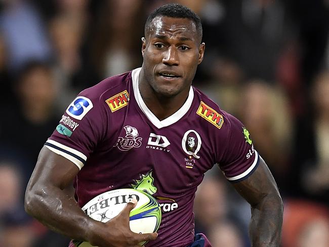 BRISBANE, AUSTRALIA - MAY 22: Suliasi Vunivalu of the Reds runs with the ball during the round two Super Rugby Trans-Tasman match between the Queensland Reds and the Crusaders at Suncorp Stadium on May 22, 2021 in Brisbane, Australia. (Photo by Albert Perez/Getty Images)