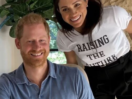 In the documentary, Meghan Markle is seen looking over Prince Harry's shoulder. Picture: Supplied