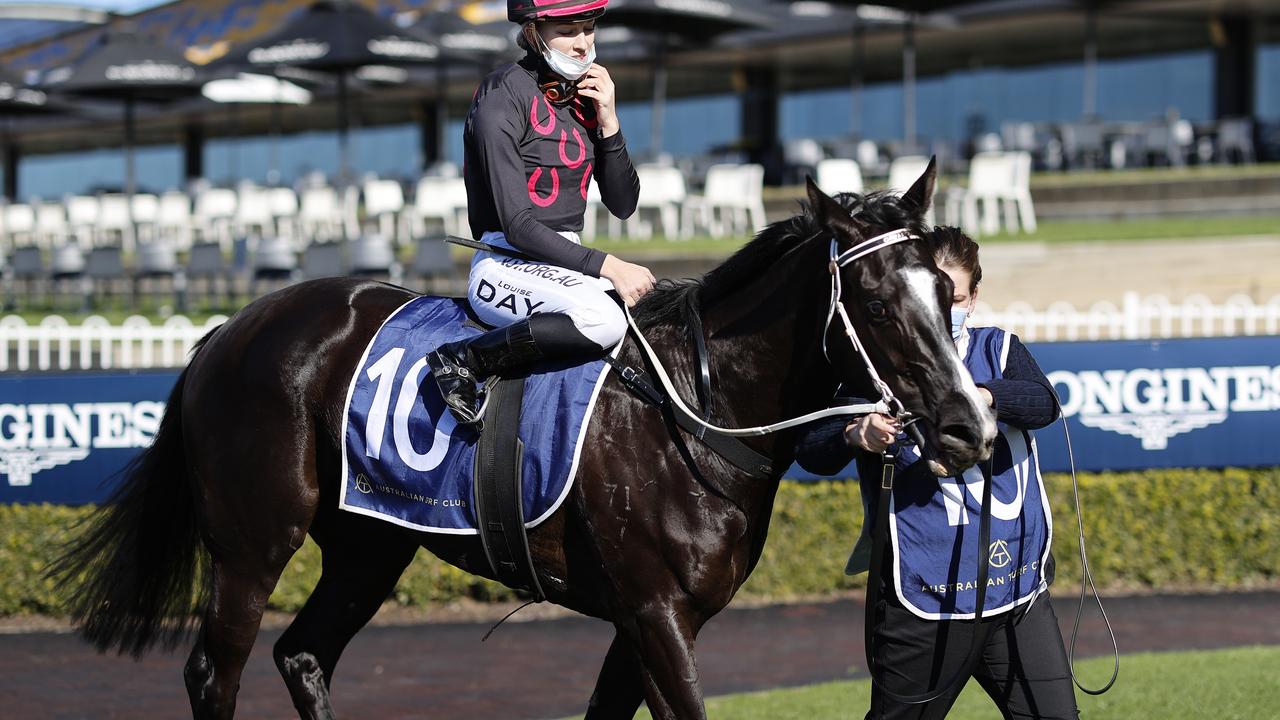 SYDNEY, AUSTRALIA - JUNE 26: Louise Day on Patino Ruby returns to scale after winning race 1 the Peter Kafataris Handicap during Sydney Racing at Rosehill Gardens on June 26, 2021 in Sydney, Australia.