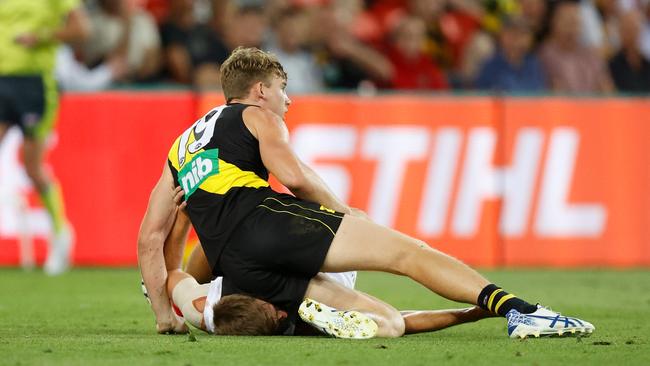 Dumb behaviour? Tom Lynch and Dougal Howard clash in the third quarter.