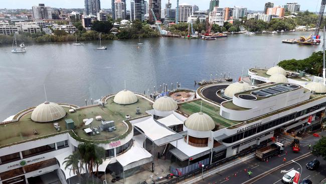 The demolition of Eagle Street Pier ramped up on Thursday. Picture: David Clark