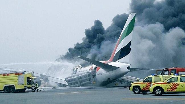 Deadly blaze ... A firefighter died trying to douse an Emirates 777 after a belly landing in Dubai. Picture: Twitter