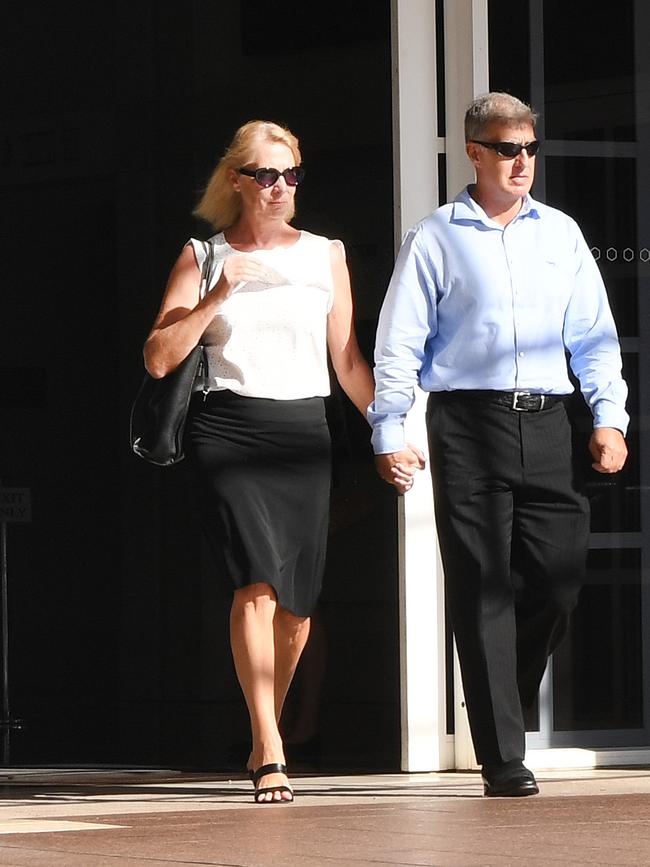 Former NT Police Assistant Commissioner Peter Bravos with wife Cindy Bravos leaves Darwin Supreme Court.