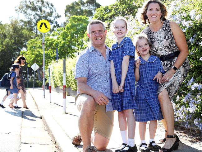 Pictured outside Five Dock Public School in Sydney are Heather and Angus Hilton with their daughters Abbey, 7, and Georgina, 5. Picture: Tim Hunter.