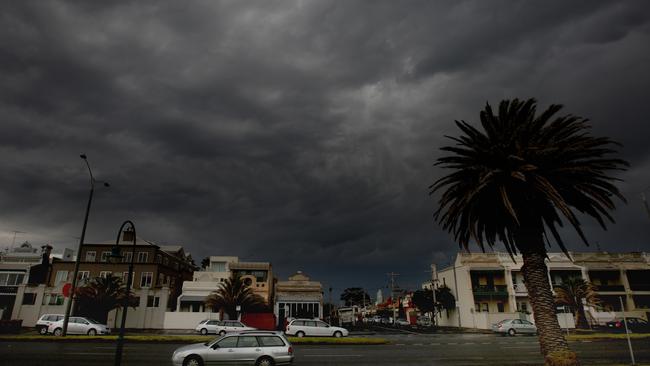 Dark clouds herald a spring thunderstorm over Melbourne. Picture: News Corp.